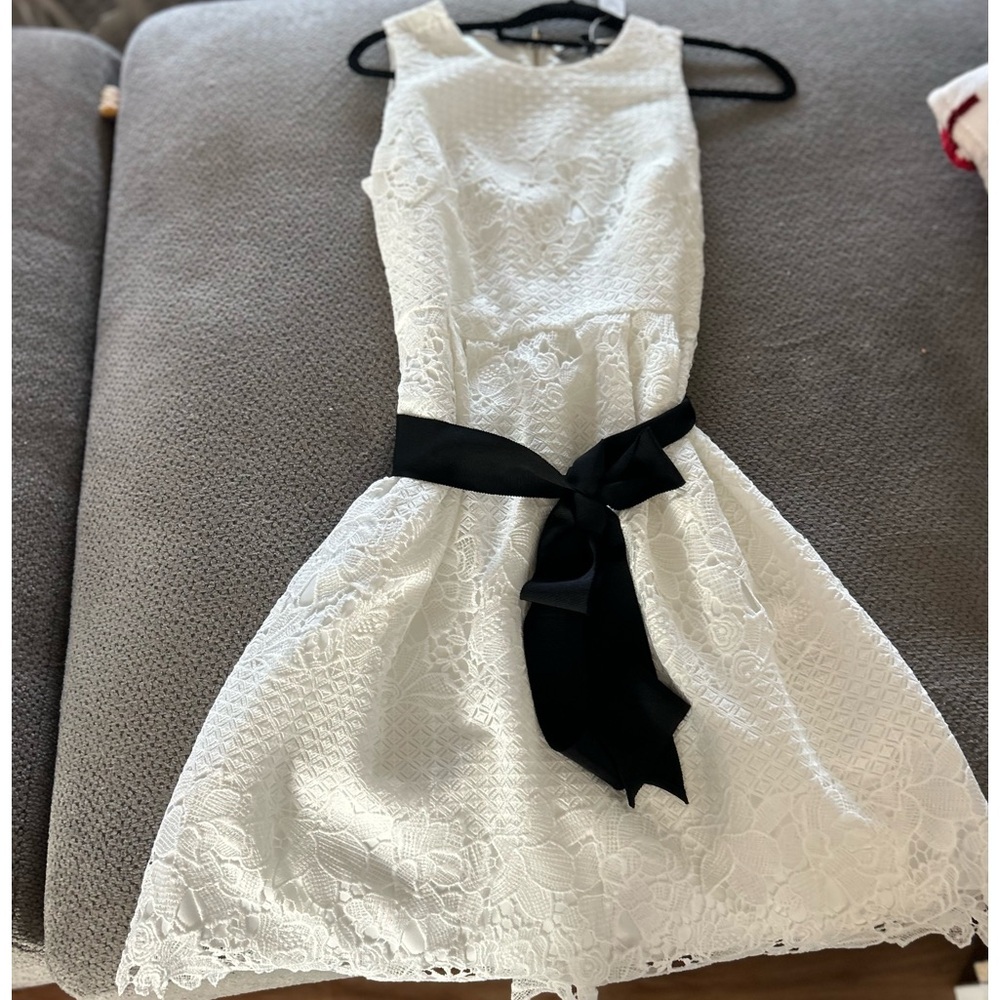 White House Black Market white dress brand new with tags on it